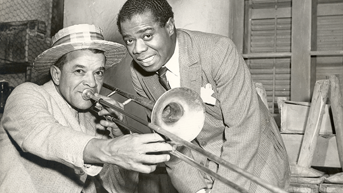 Louis Armstrong Biography - Sunshine and Music